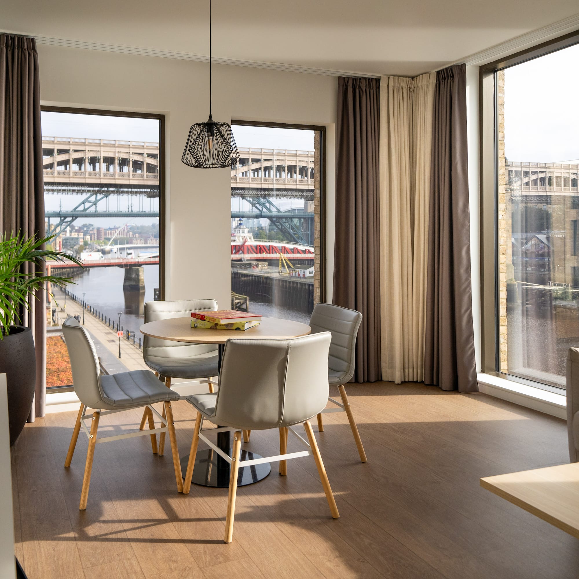 a room with a table and chairs