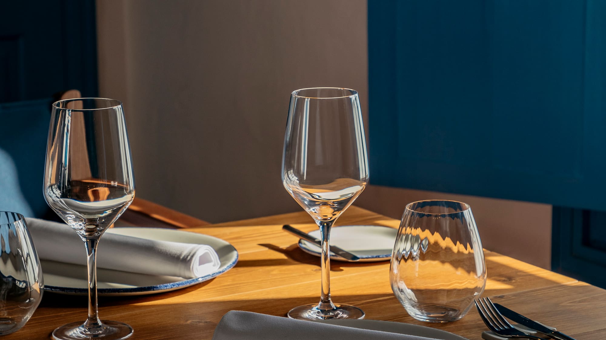 a table with plates and glasses