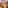 Terracotta balcony with outdoor seating, scenic sea view, and coastal resort.