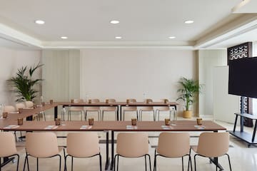 a room with tables and chairs