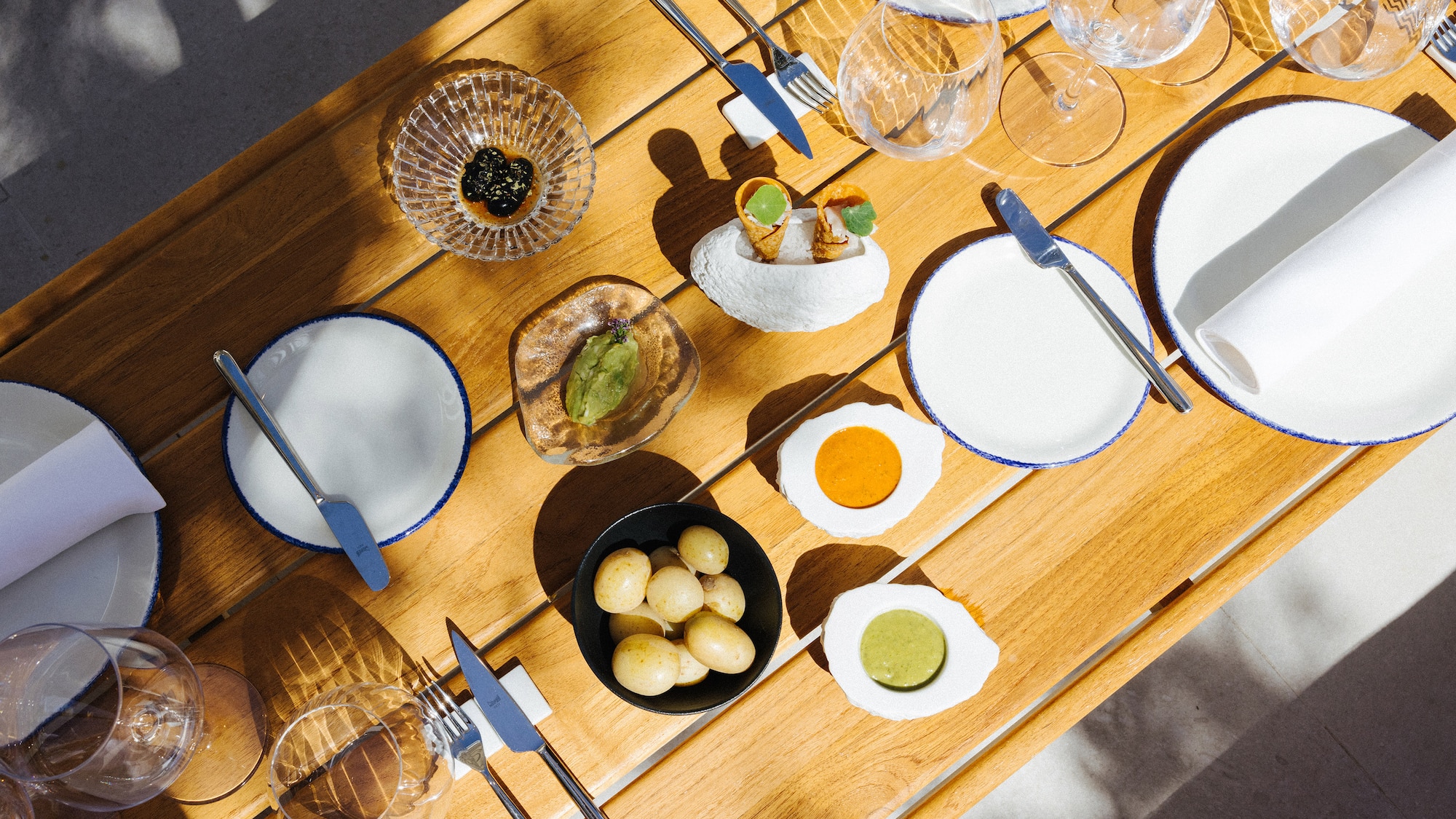 a table with plates and utensils