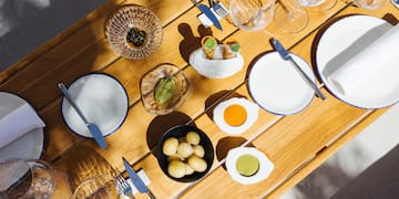 a table with plates and utensils
