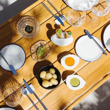 a table with plates and utensils