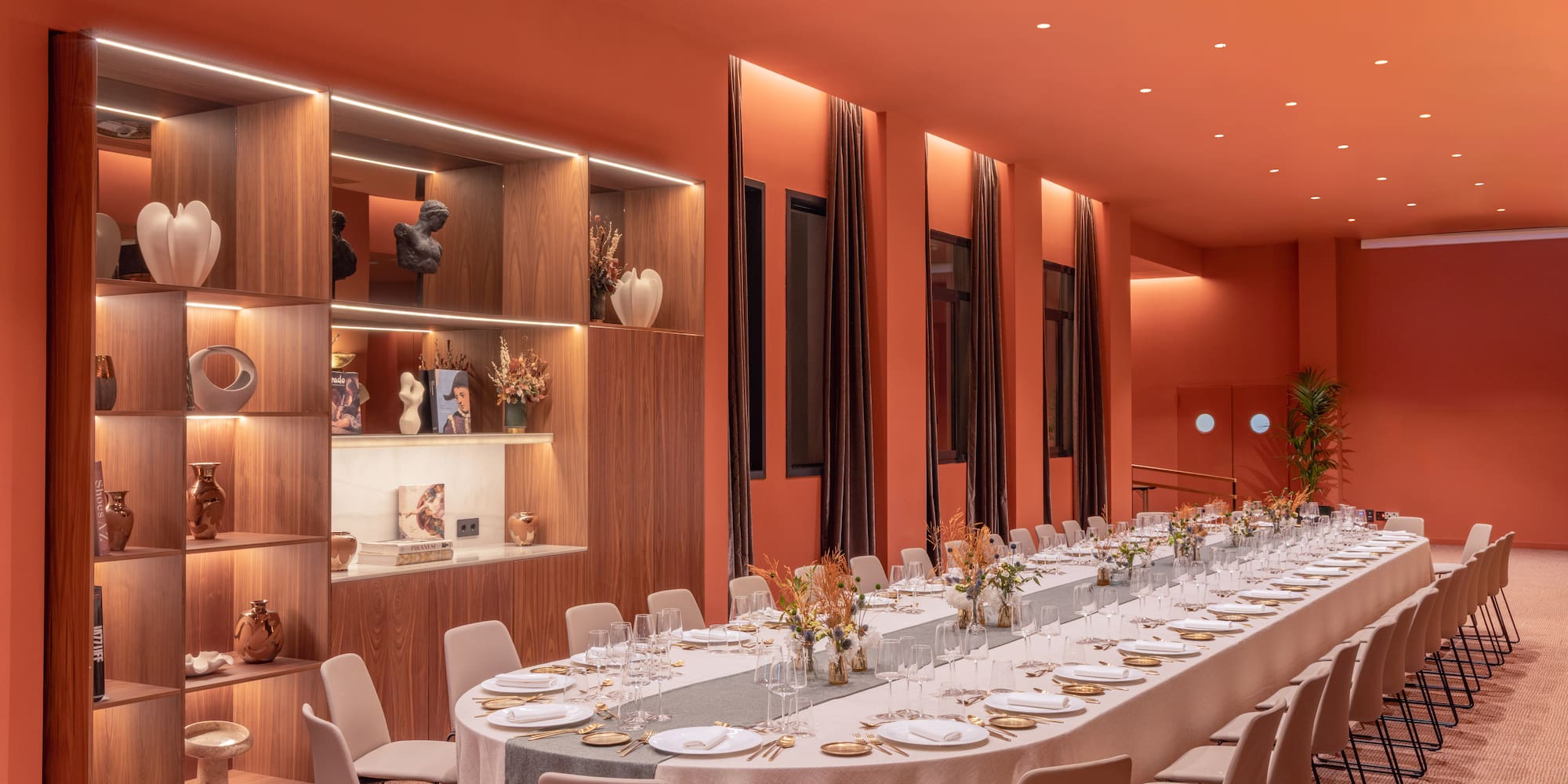 a long table set for a dinner party