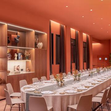 a long table set for a dinner party