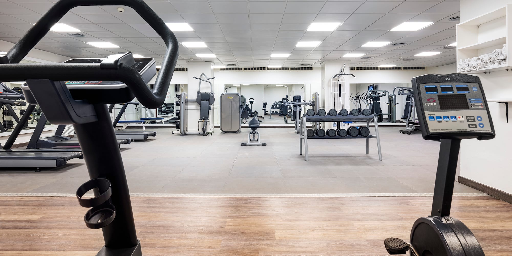 a room with exercise bikes and exercise equipment