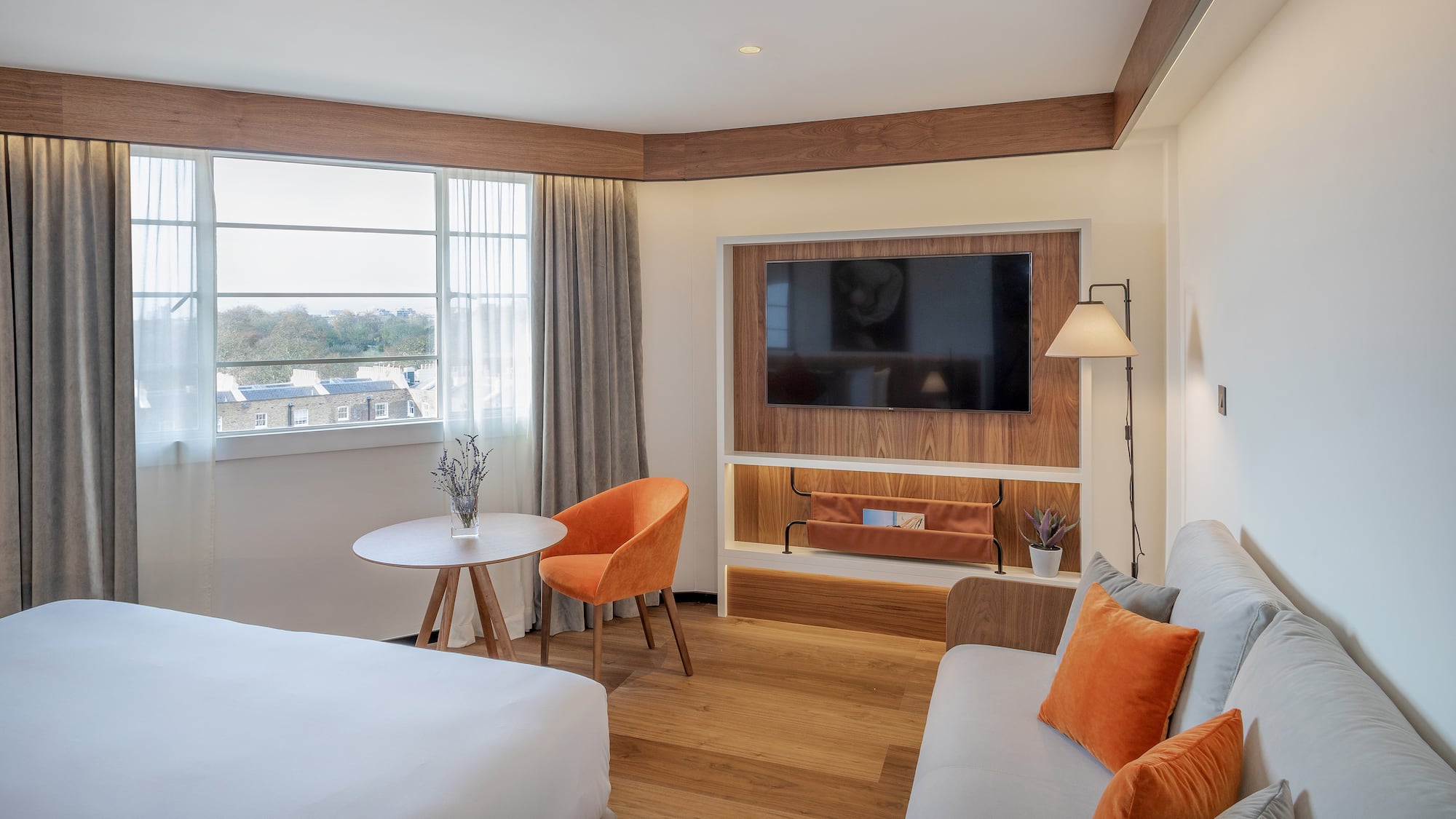 a room with a tv and couches