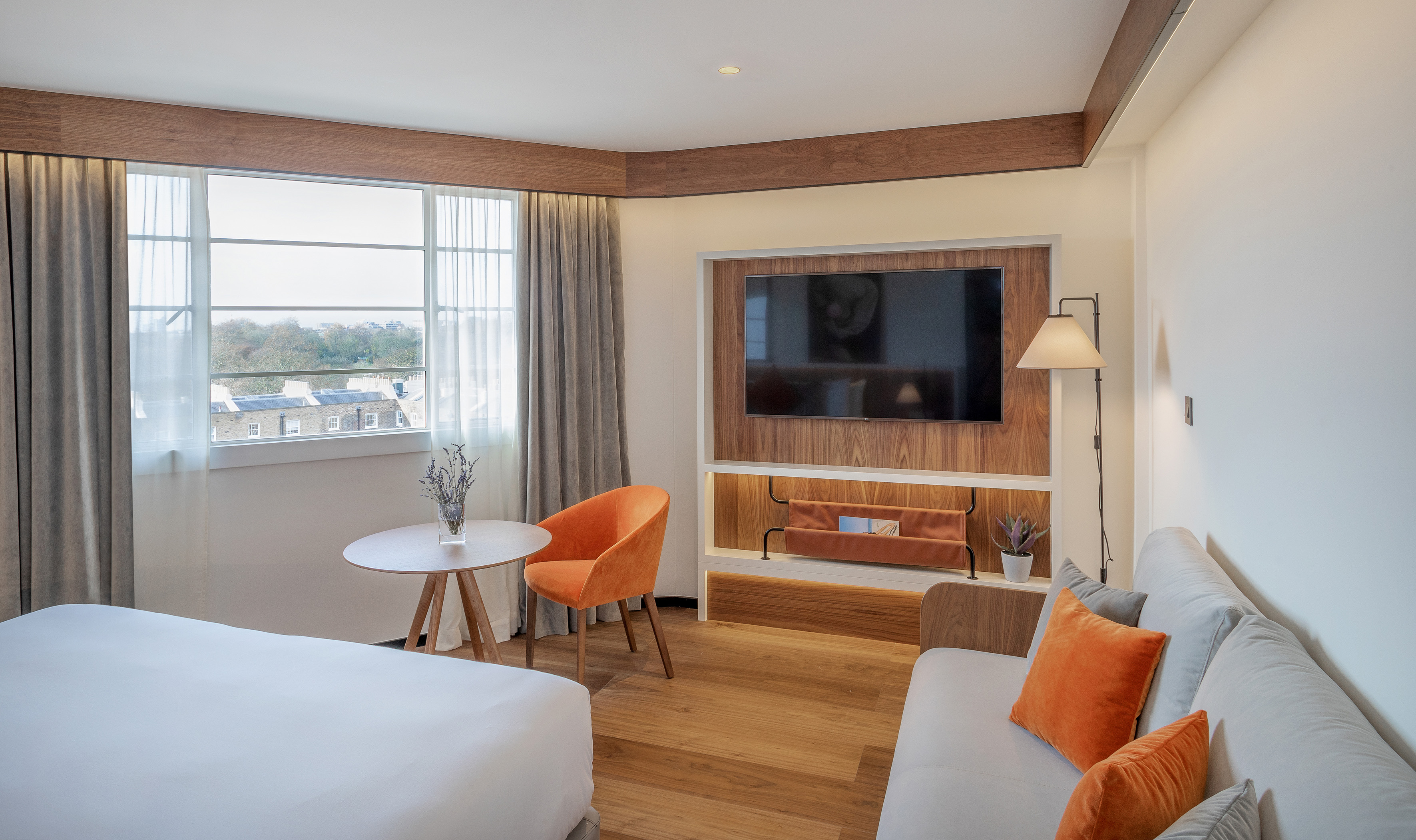 a room with a tv and couches