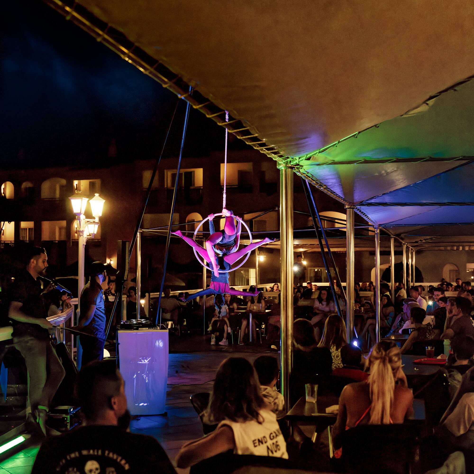 a group of people on aerial acrobats