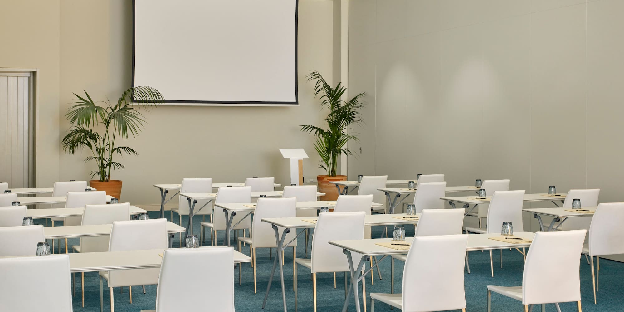 a room with tables and chairs