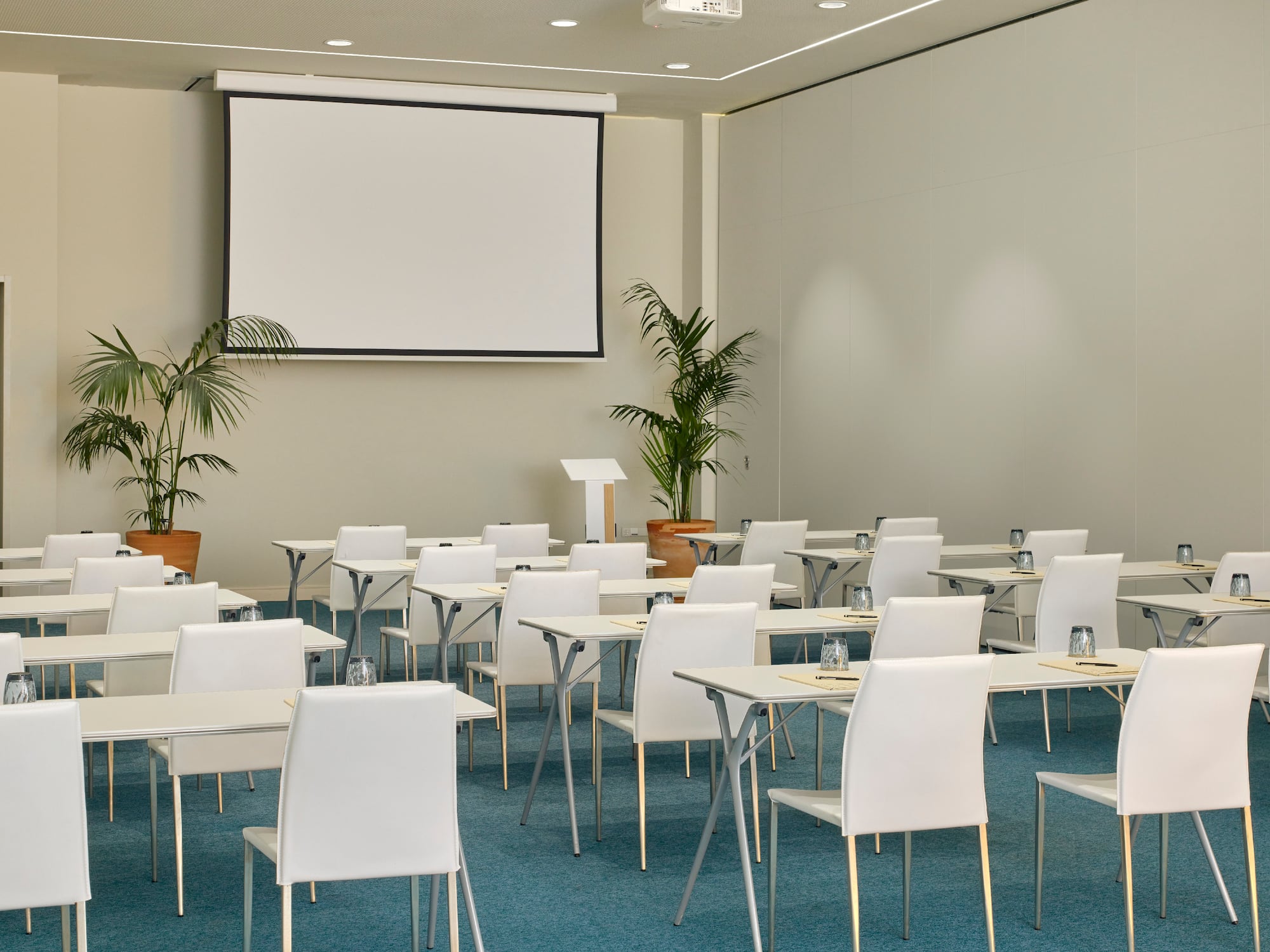 a room with tables and chairs