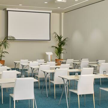 a room with tables and chairs