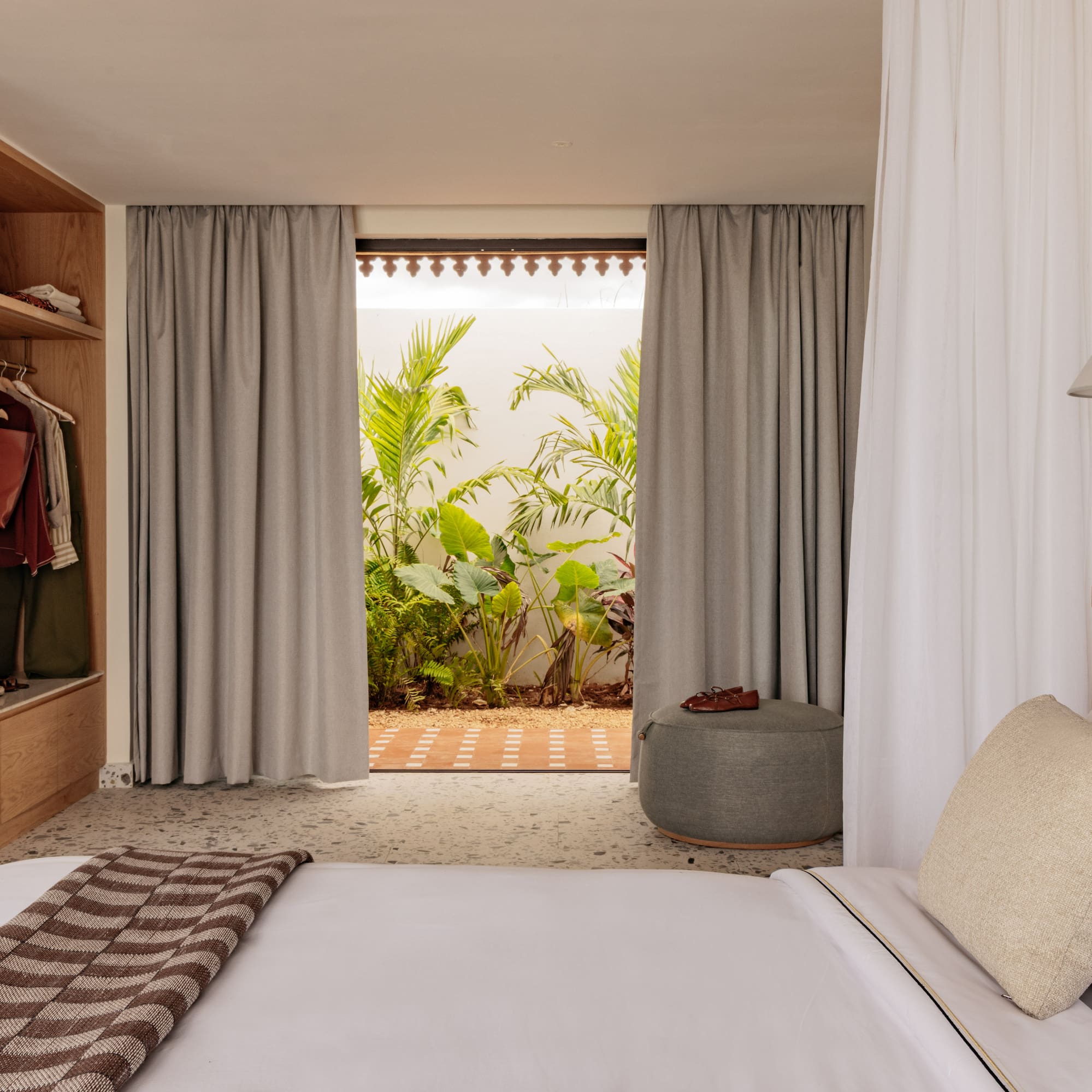 a bedroom with a bed and closet