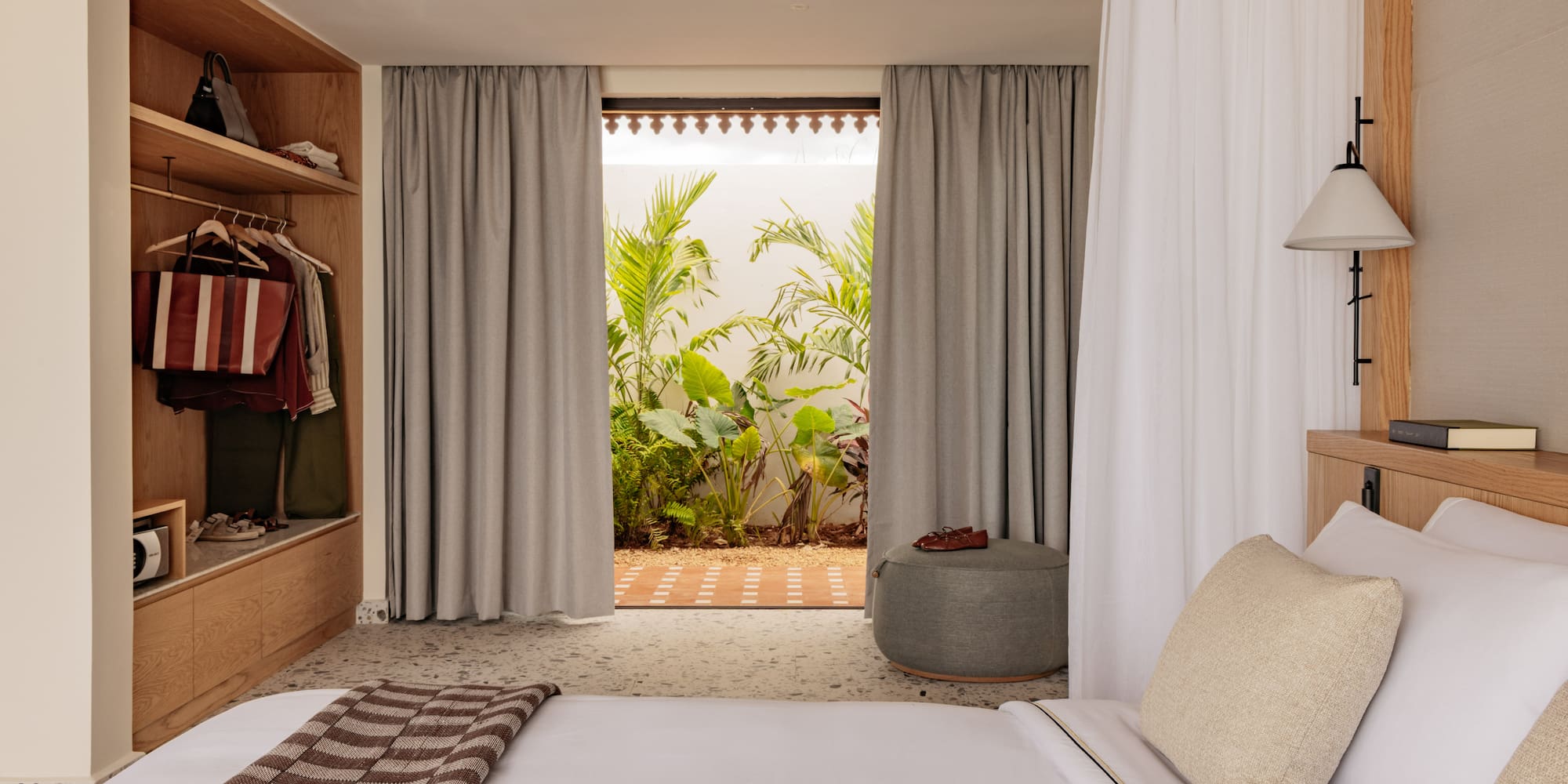 a bedroom with a bed and closet