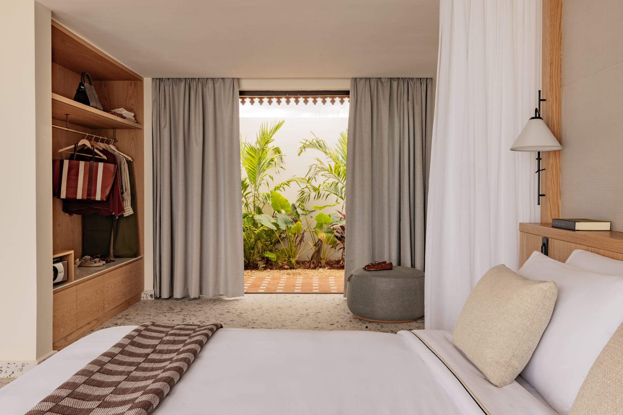 a bedroom with a bed and closet