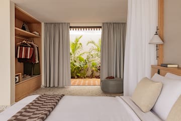 a bedroom with a bed and closet