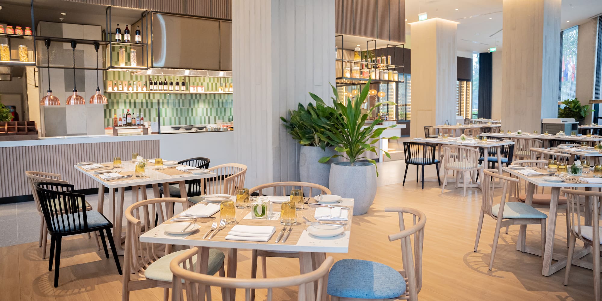 a restaurant with tables and chairs