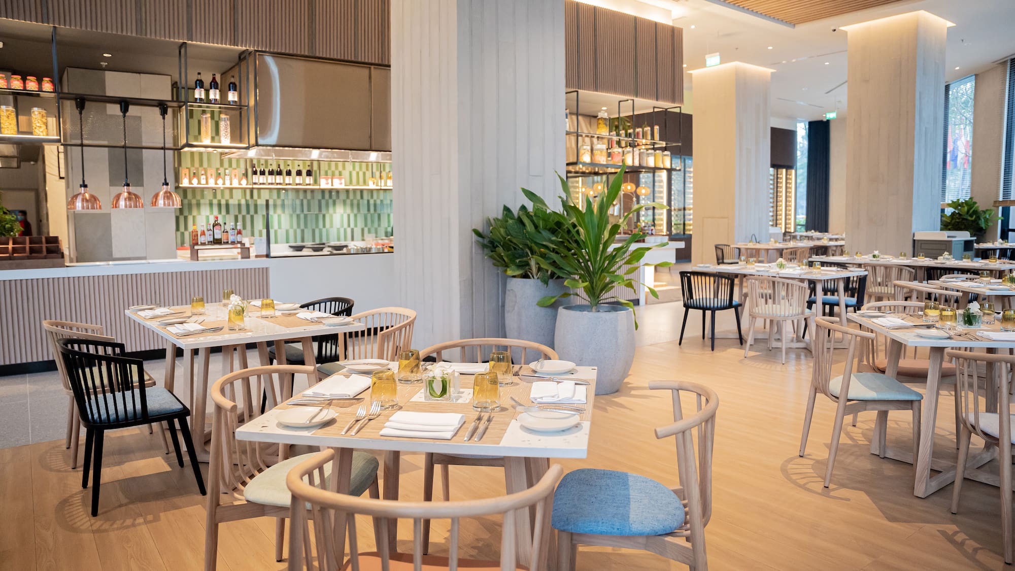 a restaurant with tables and chairs