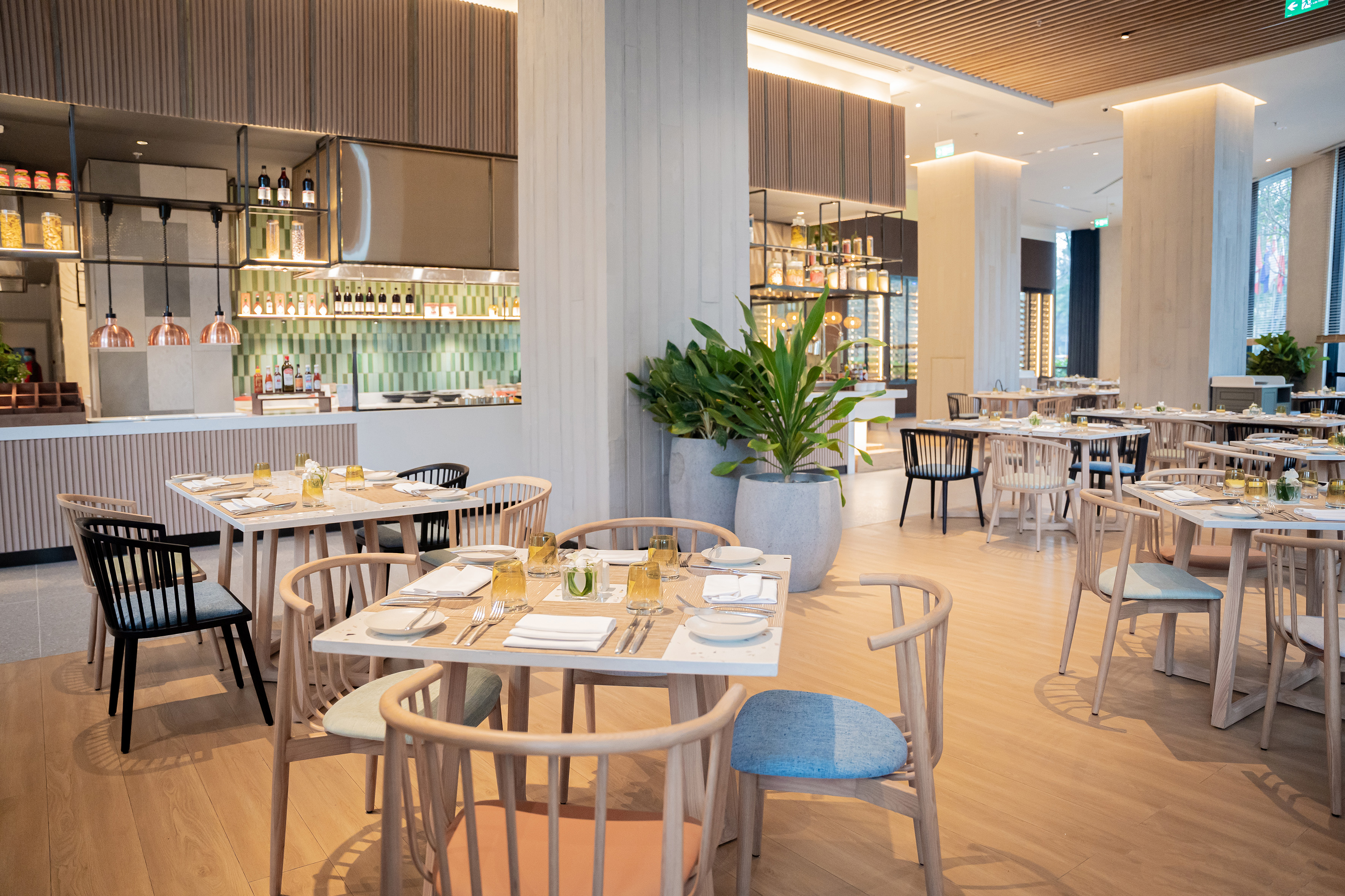a restaurant with tables and chairs