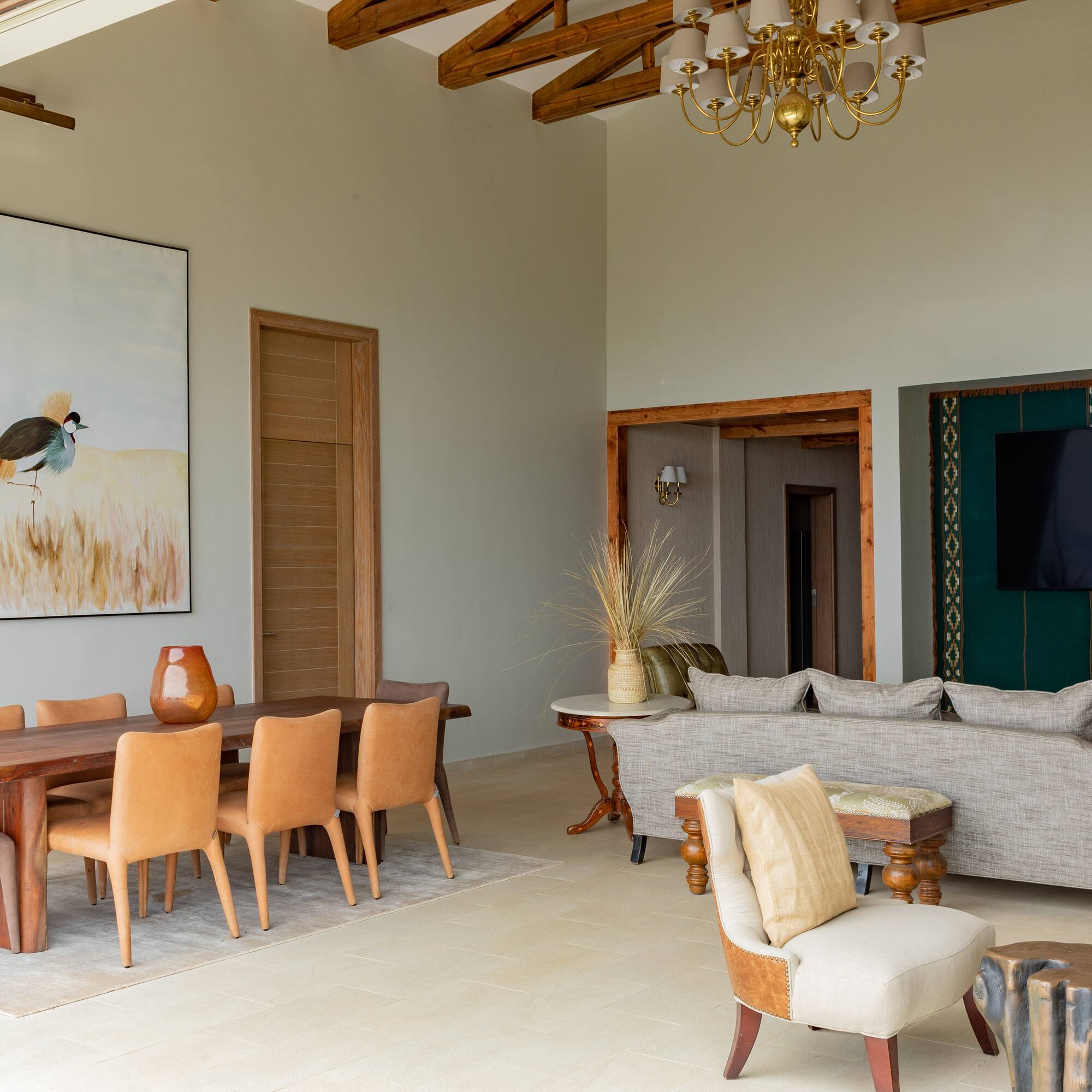 a living room with a couch and chairs