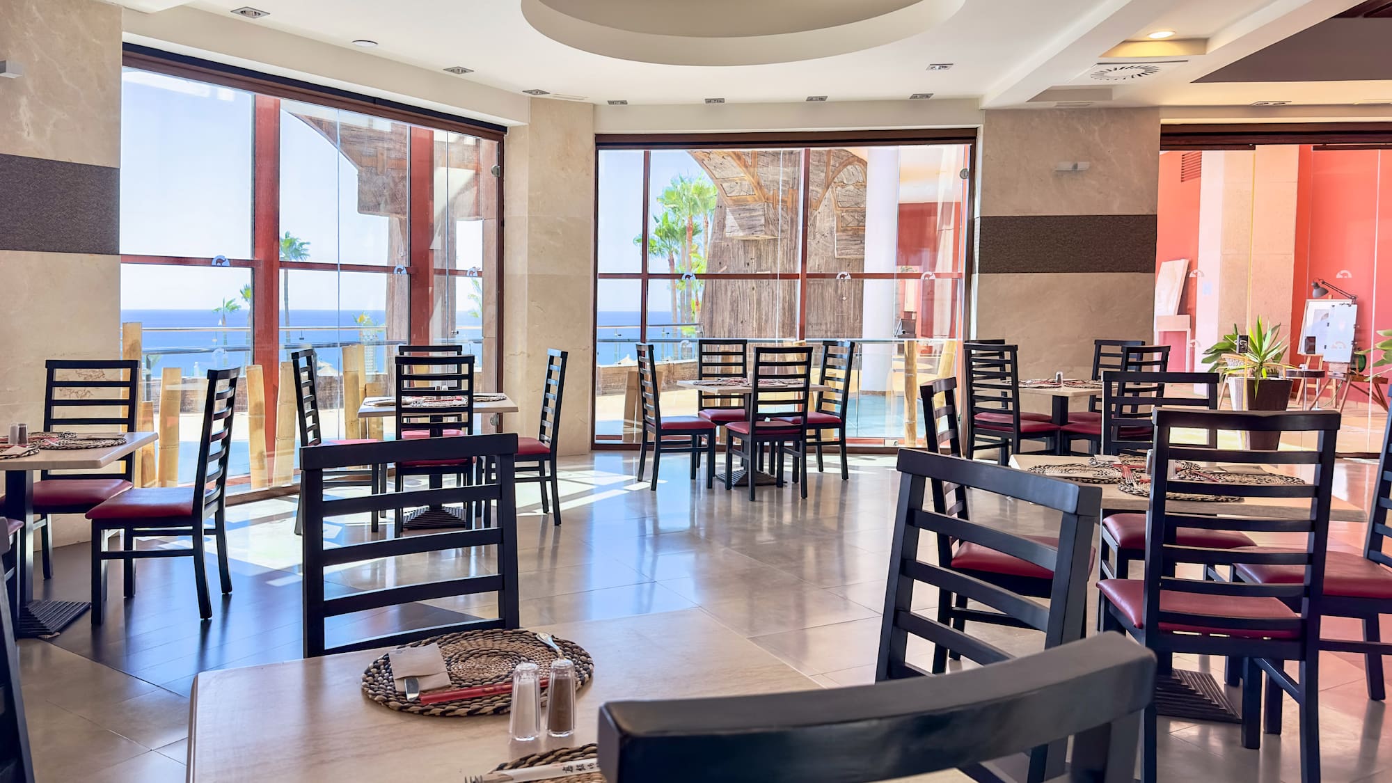 a room with tables and chairs