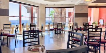 a room with tables and chairs