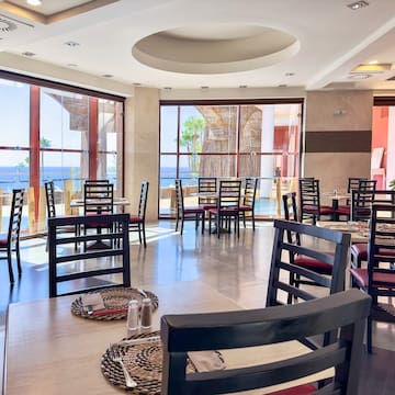 a room with tables and chairs