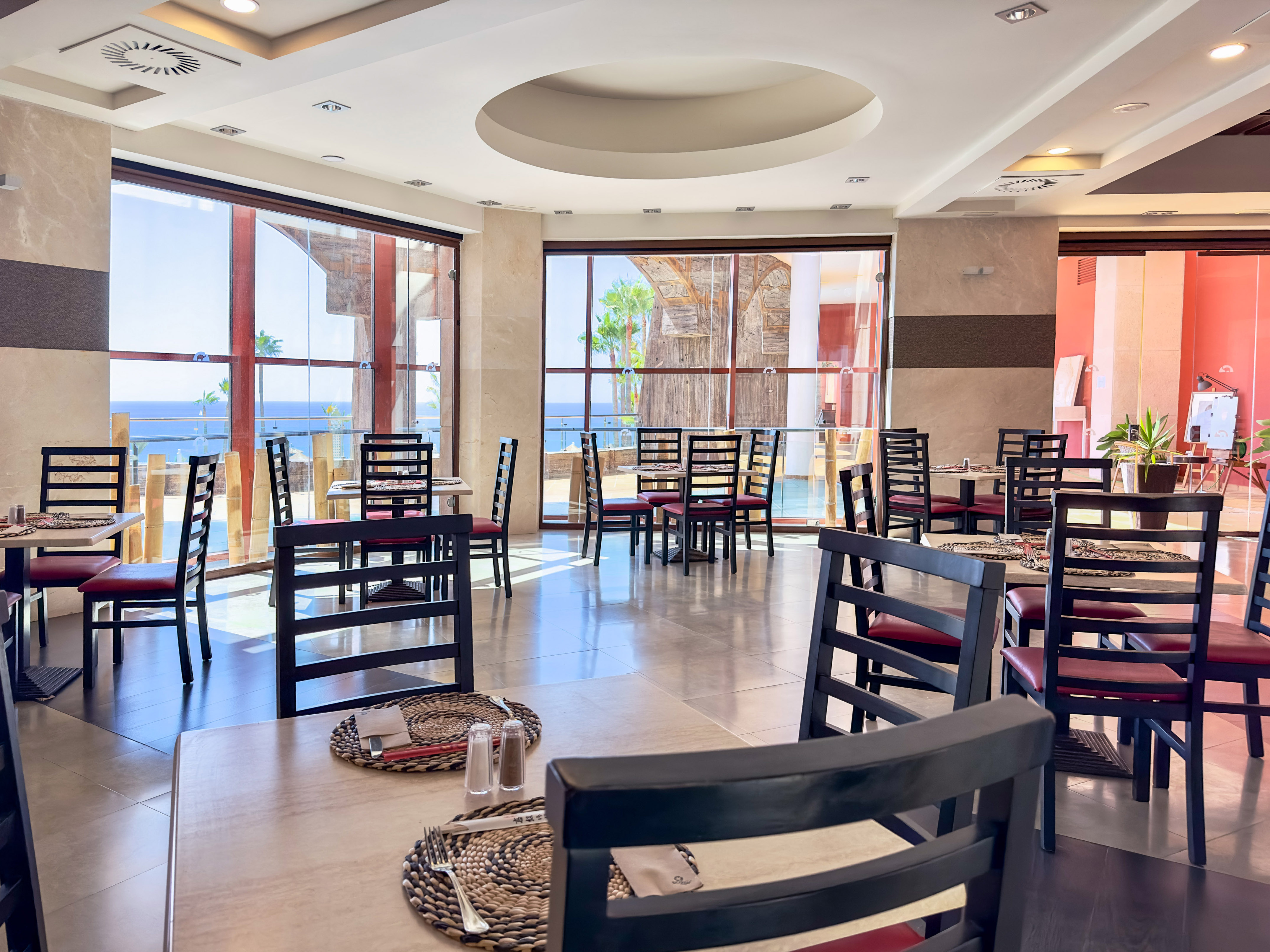 a room with tables and chairs