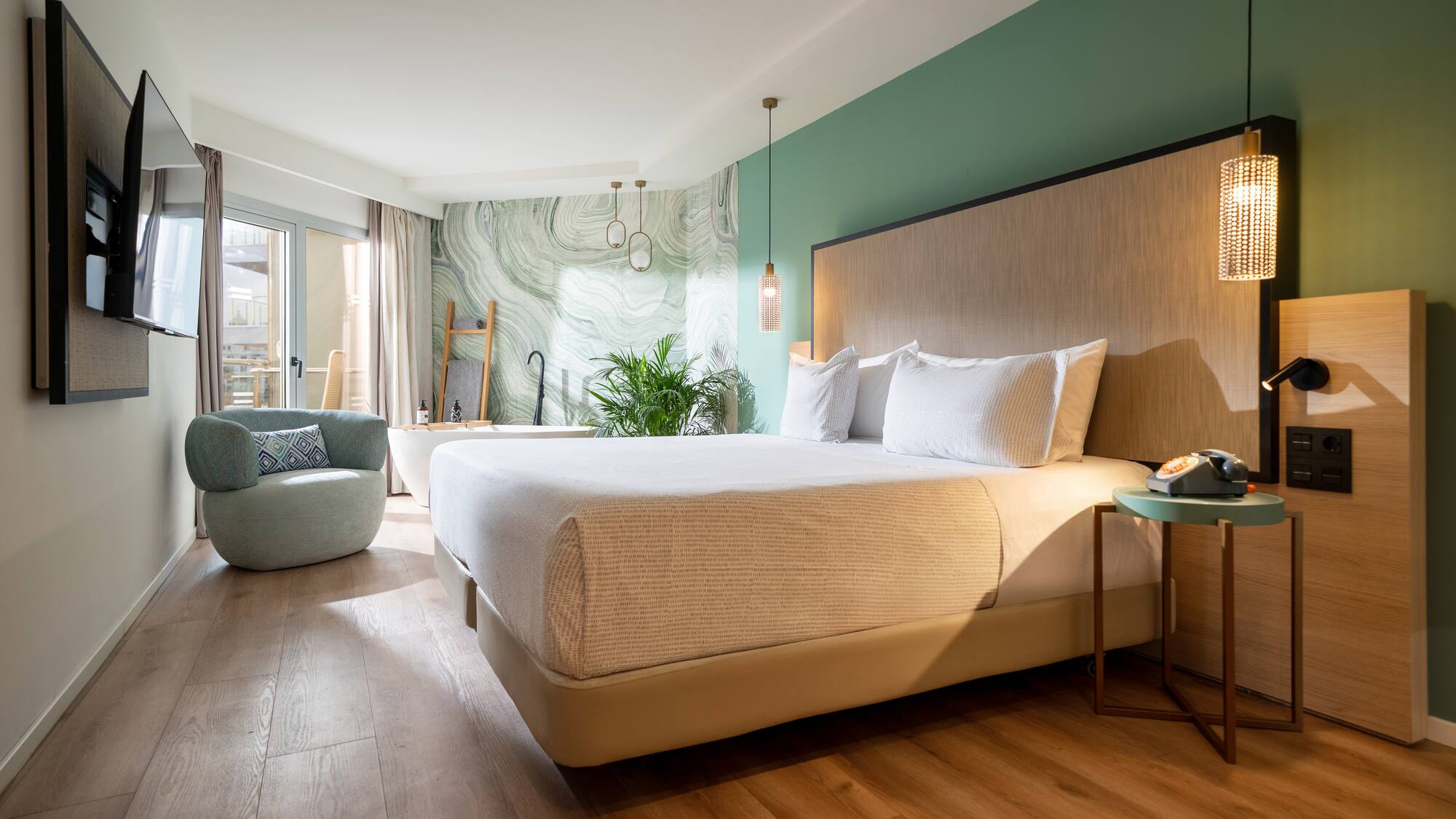 a room with a bed and a chair