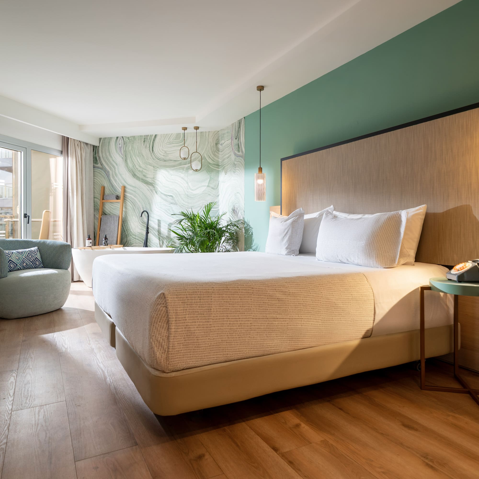 a room with a bed and a chair