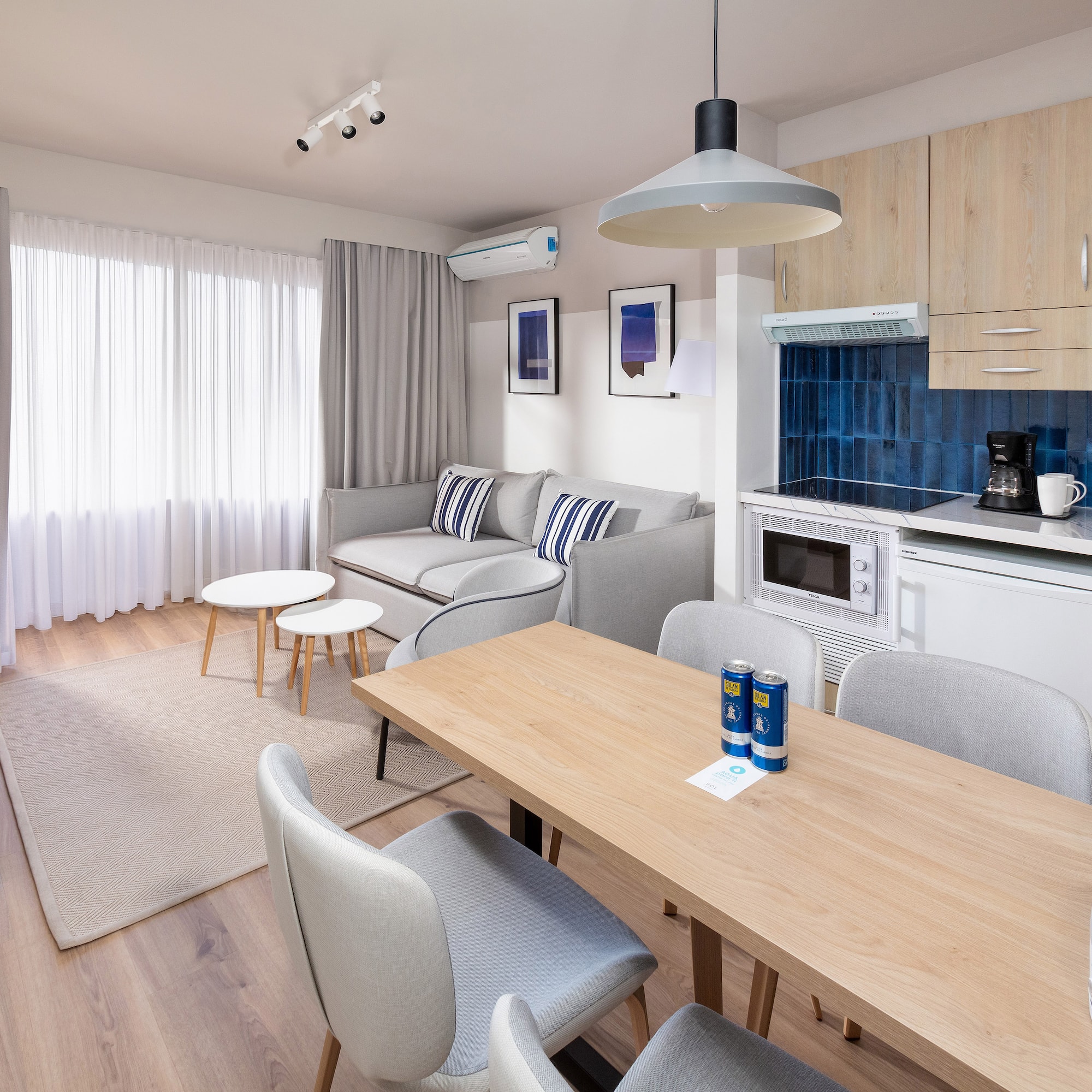 a room with a table and chairs