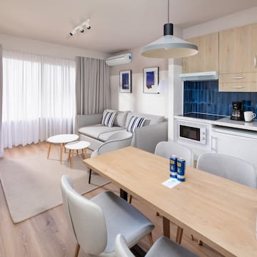 a room with a table and chairs