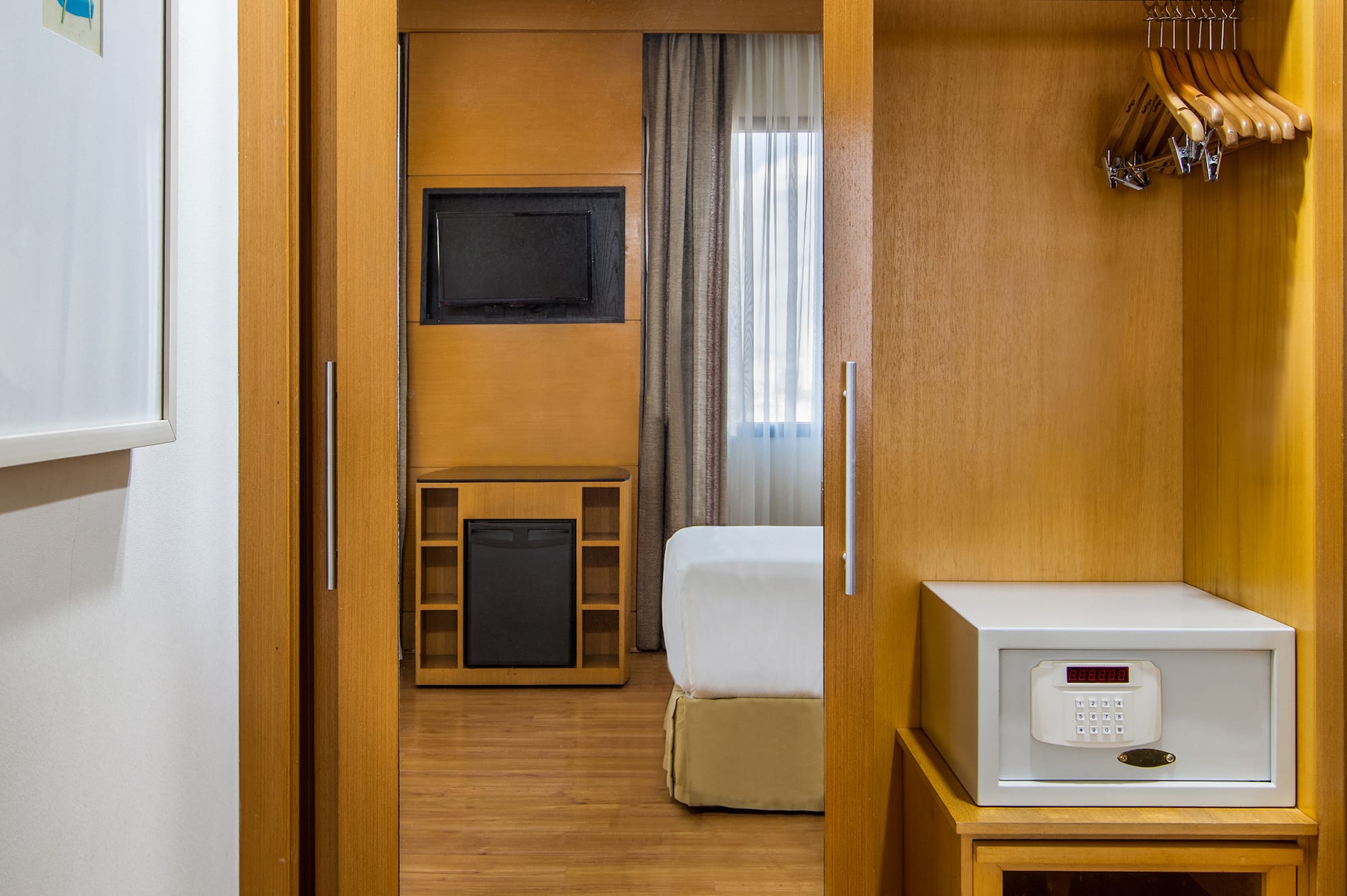 a closet with a door open