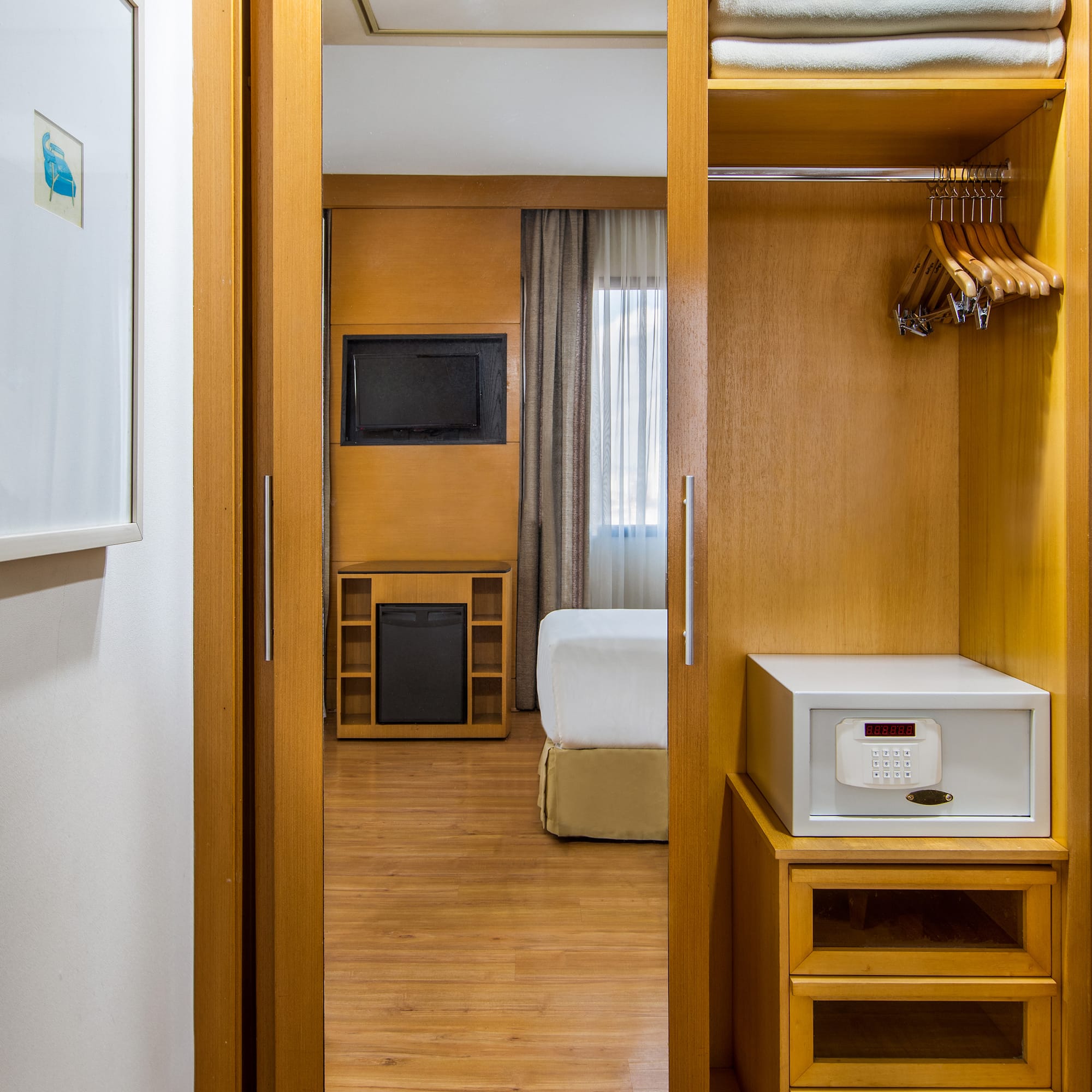 a closet with a door open