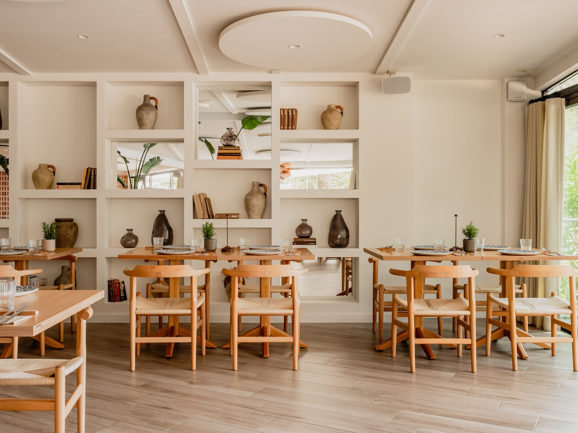 a room with tables and chairs