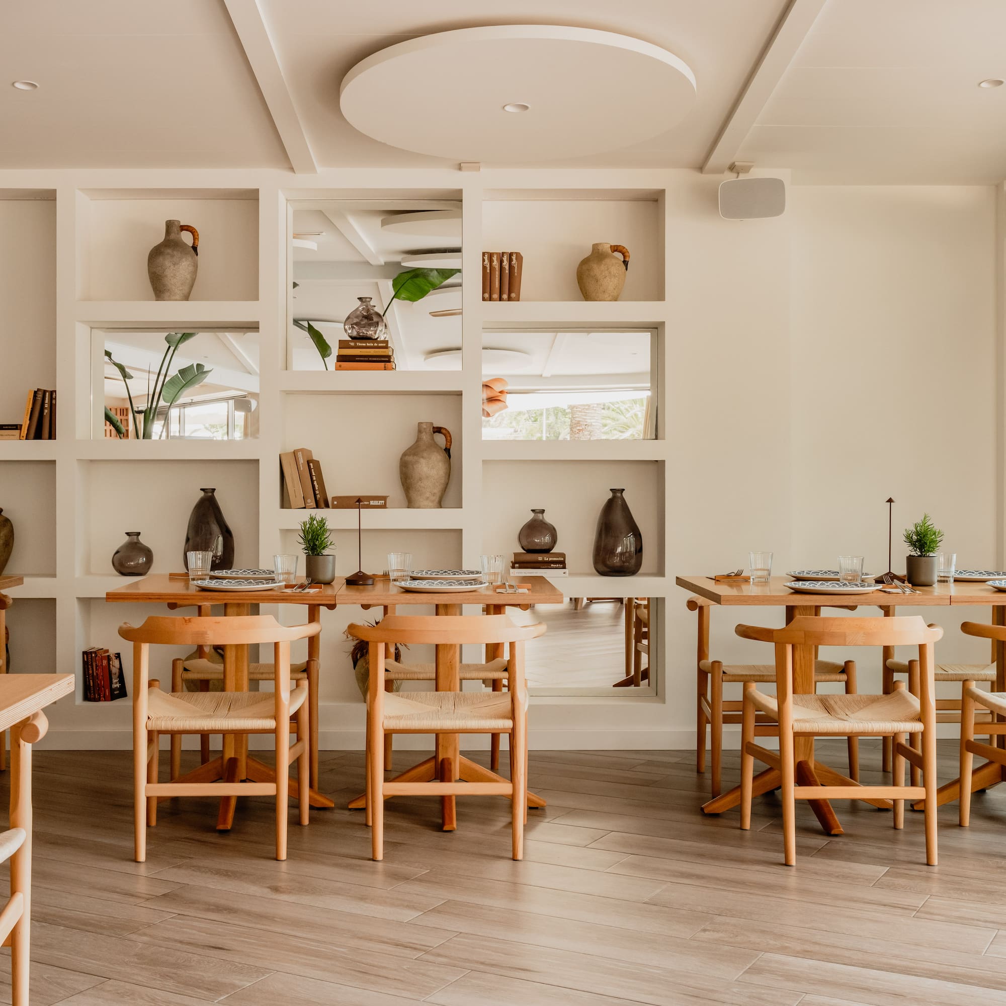 a room with tables and chairs