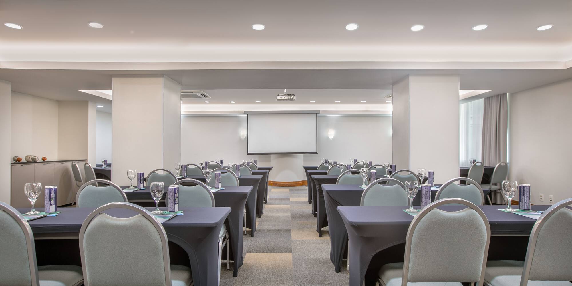 a room with tables and chairs