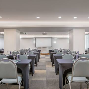 a room with tables and chairs