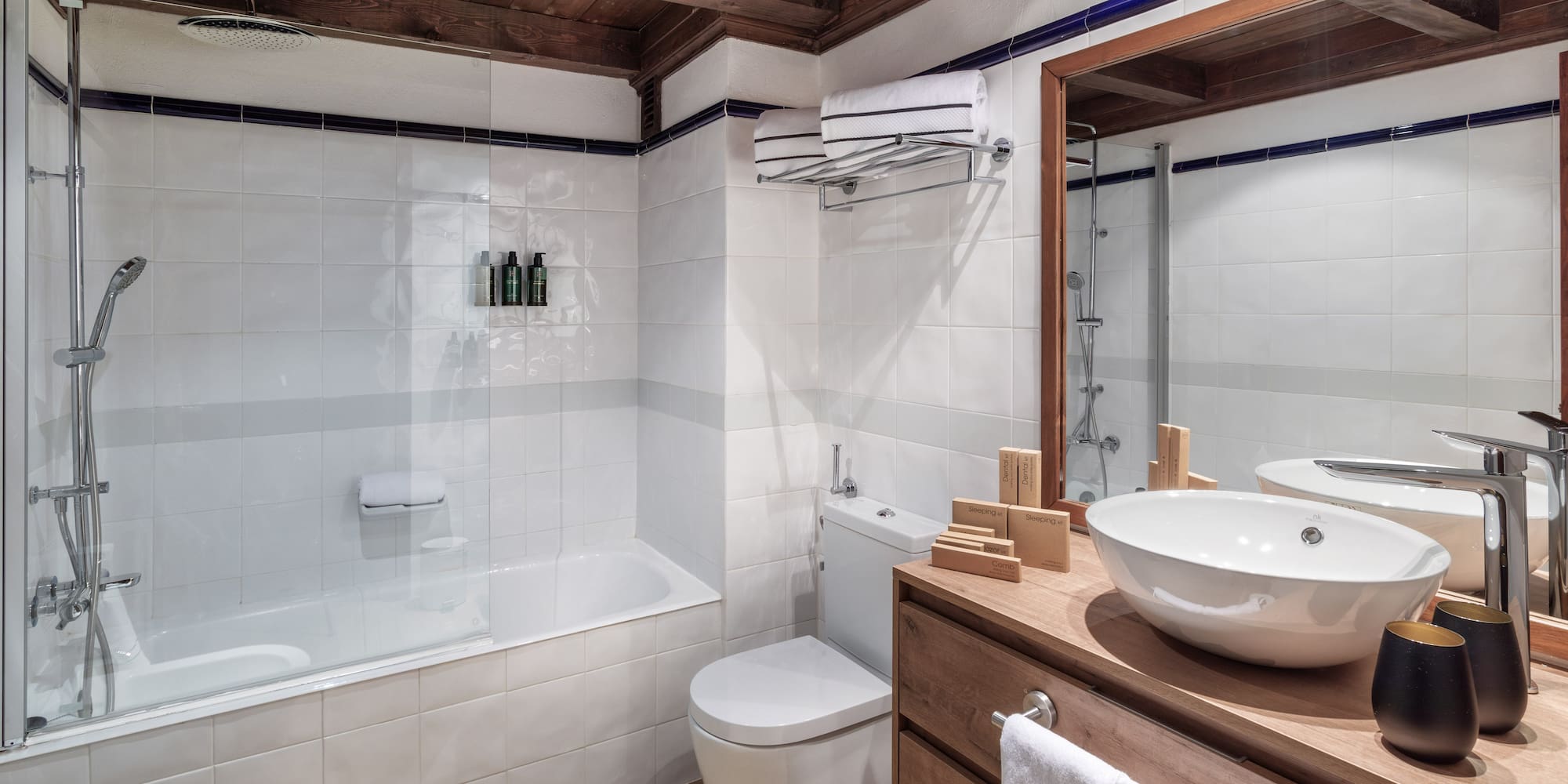 a bathroom with a sink toilet and bathtub