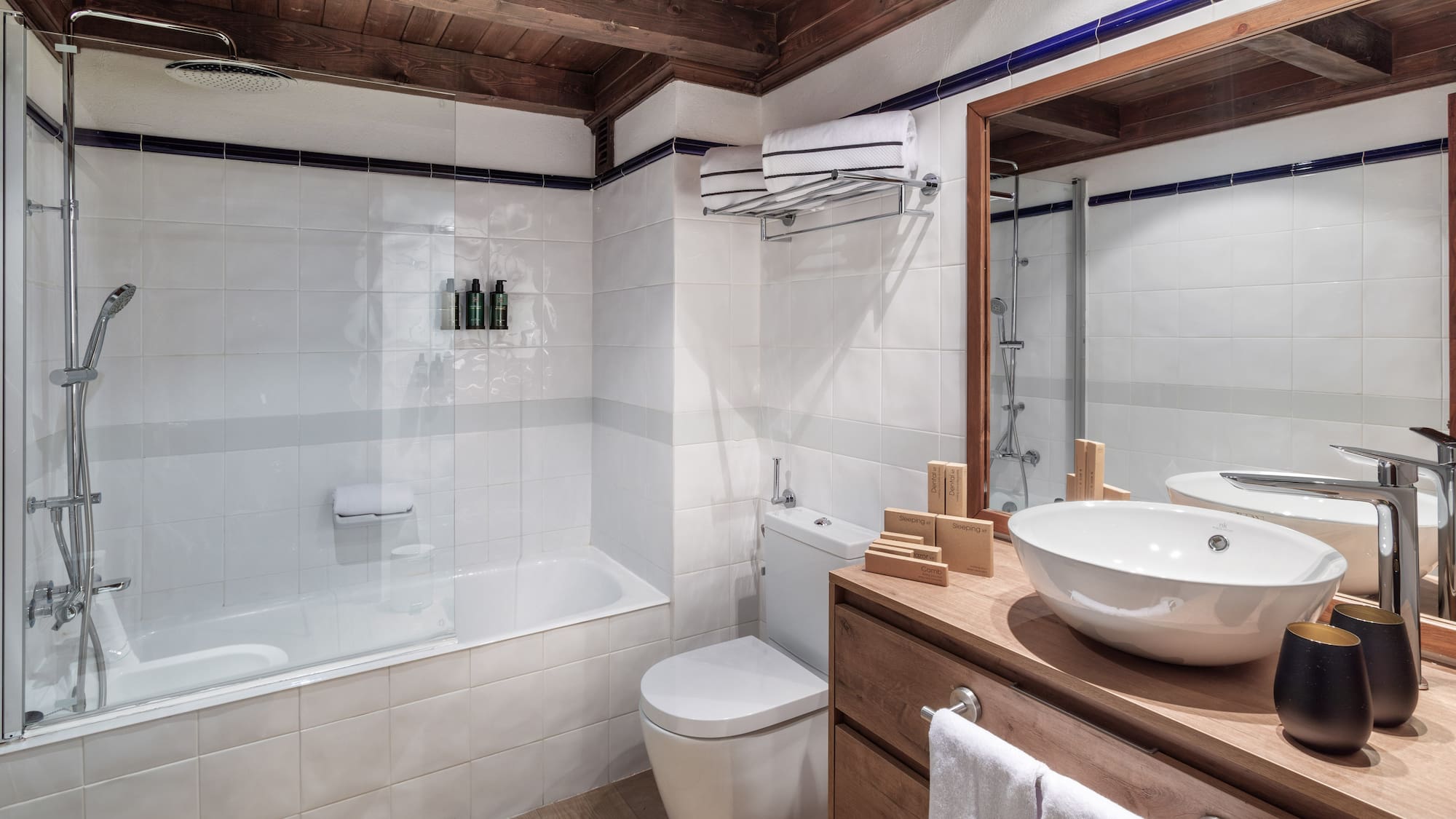 a bathroom with a sink toilet and bathtub