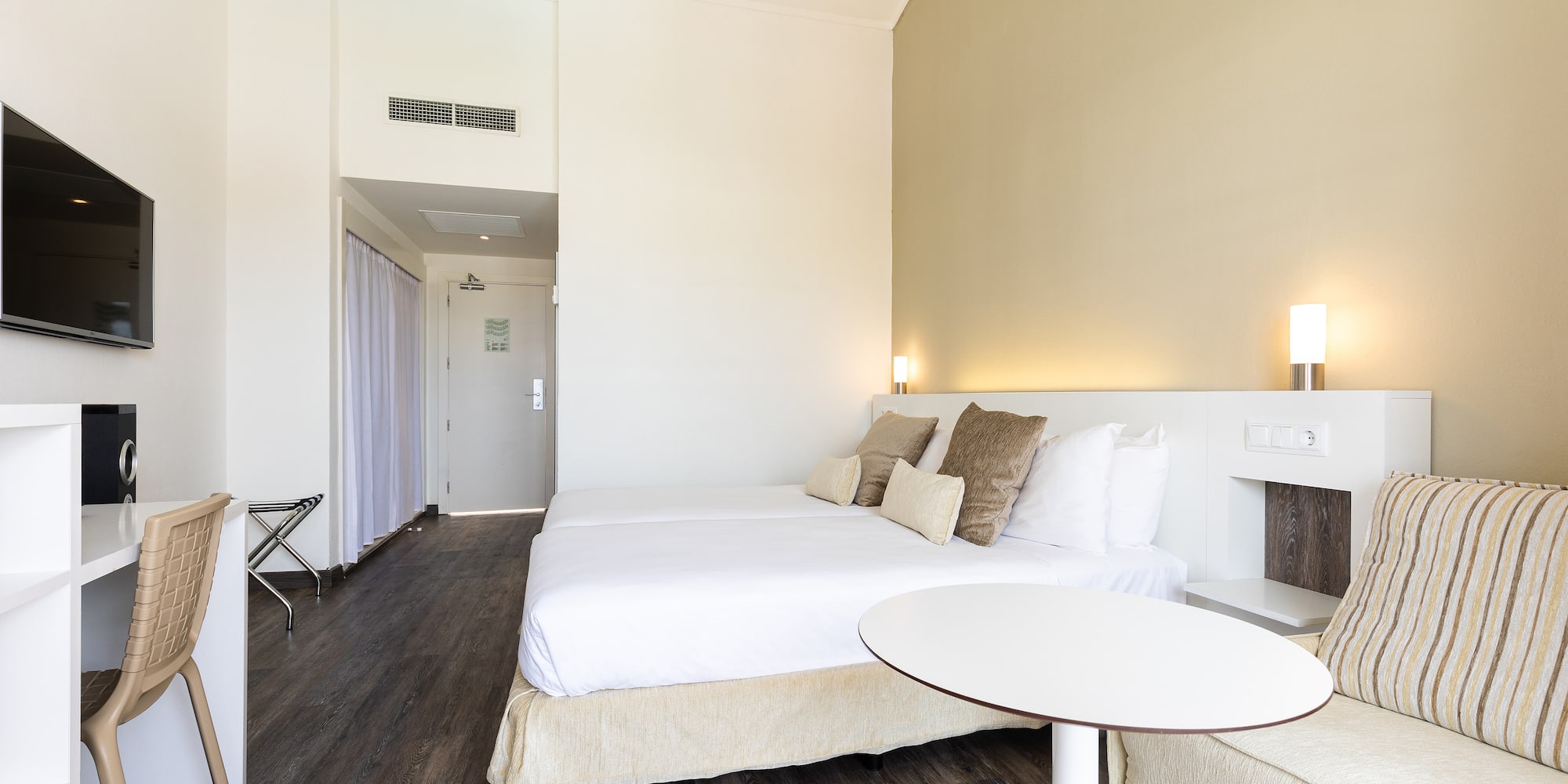 a room with a bed and a table