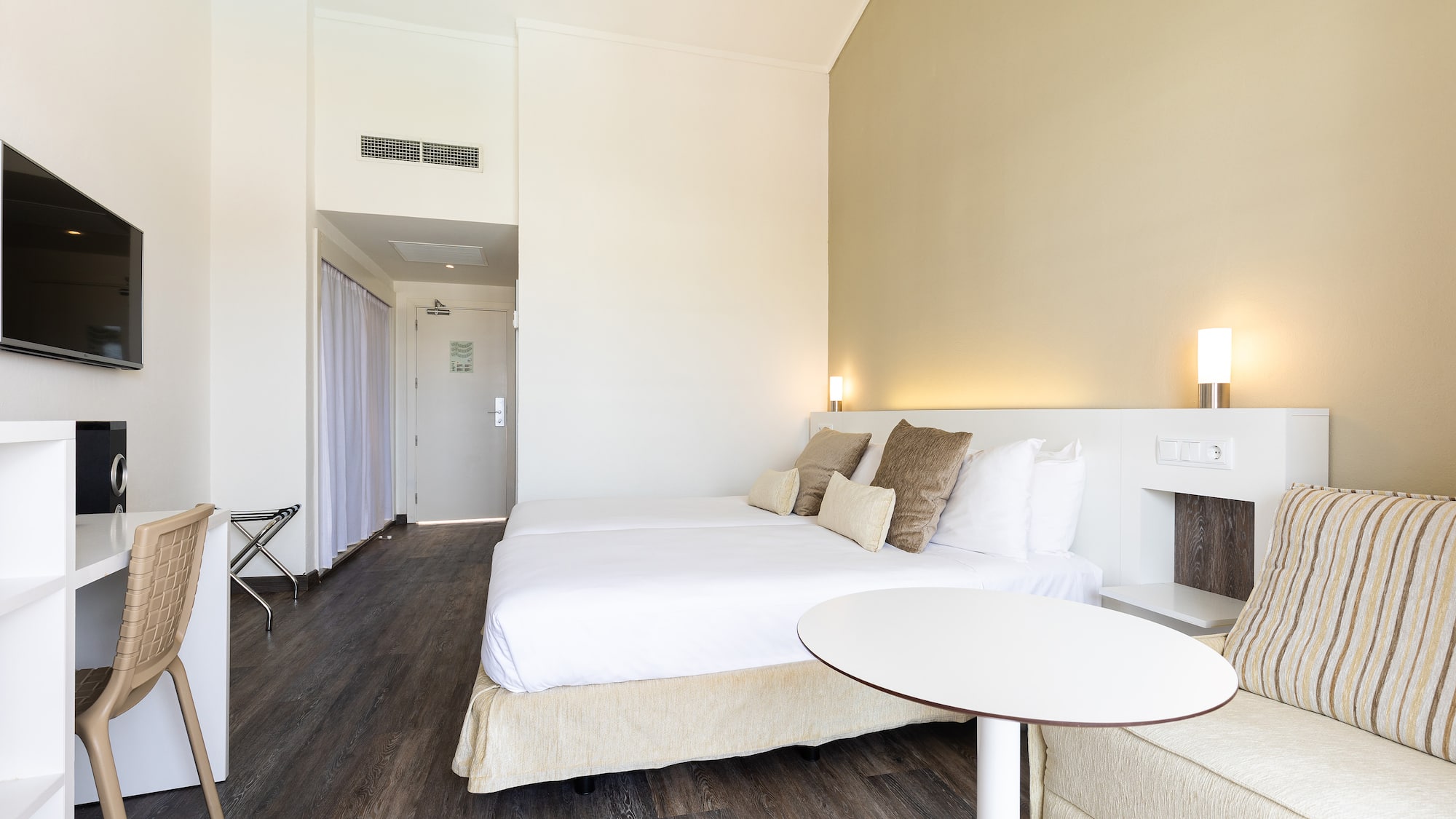 a room with a bed and a table