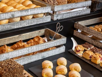 a variety of breads in wooden crates