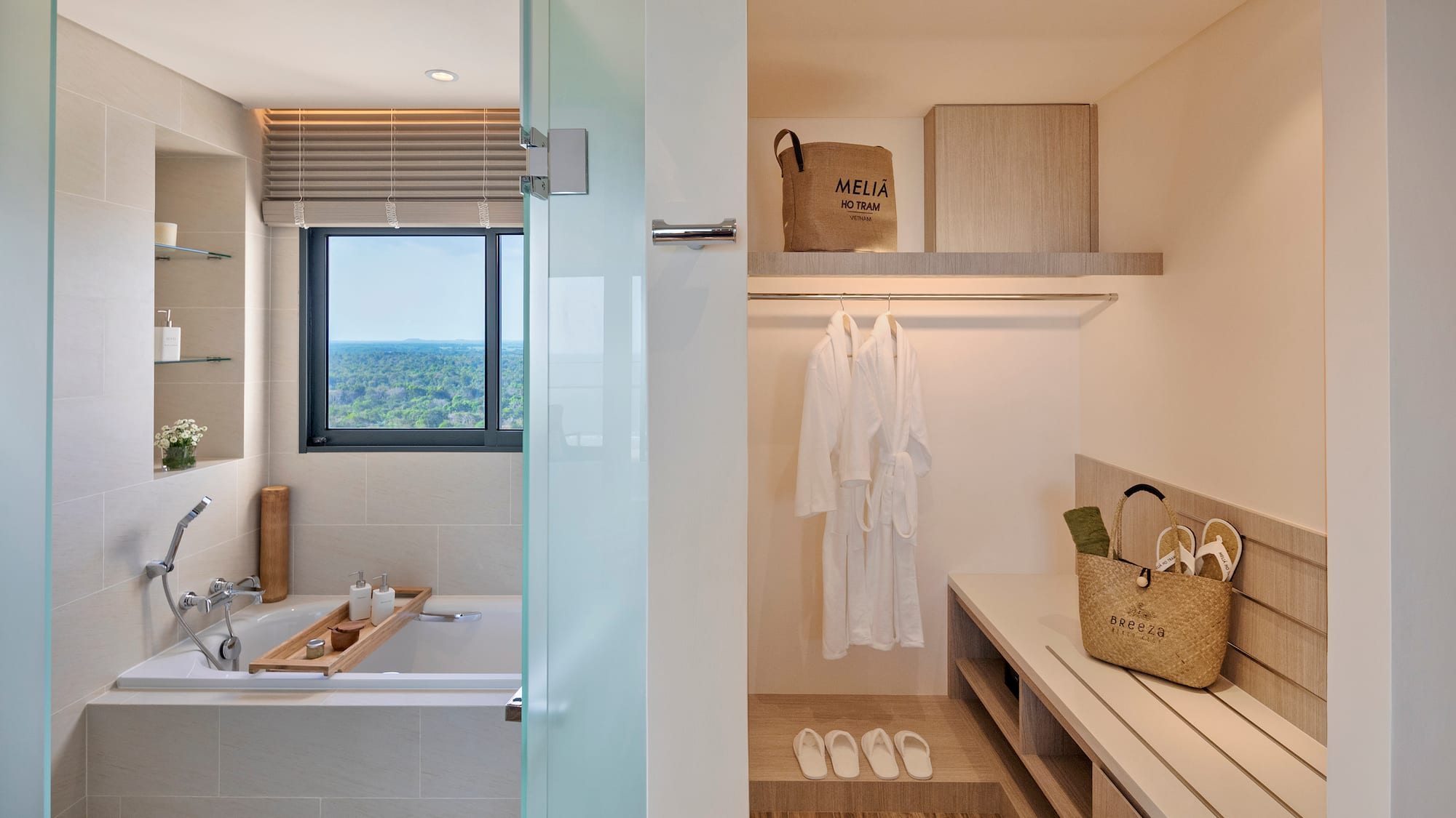 a bathroom with a bathtub and a tub