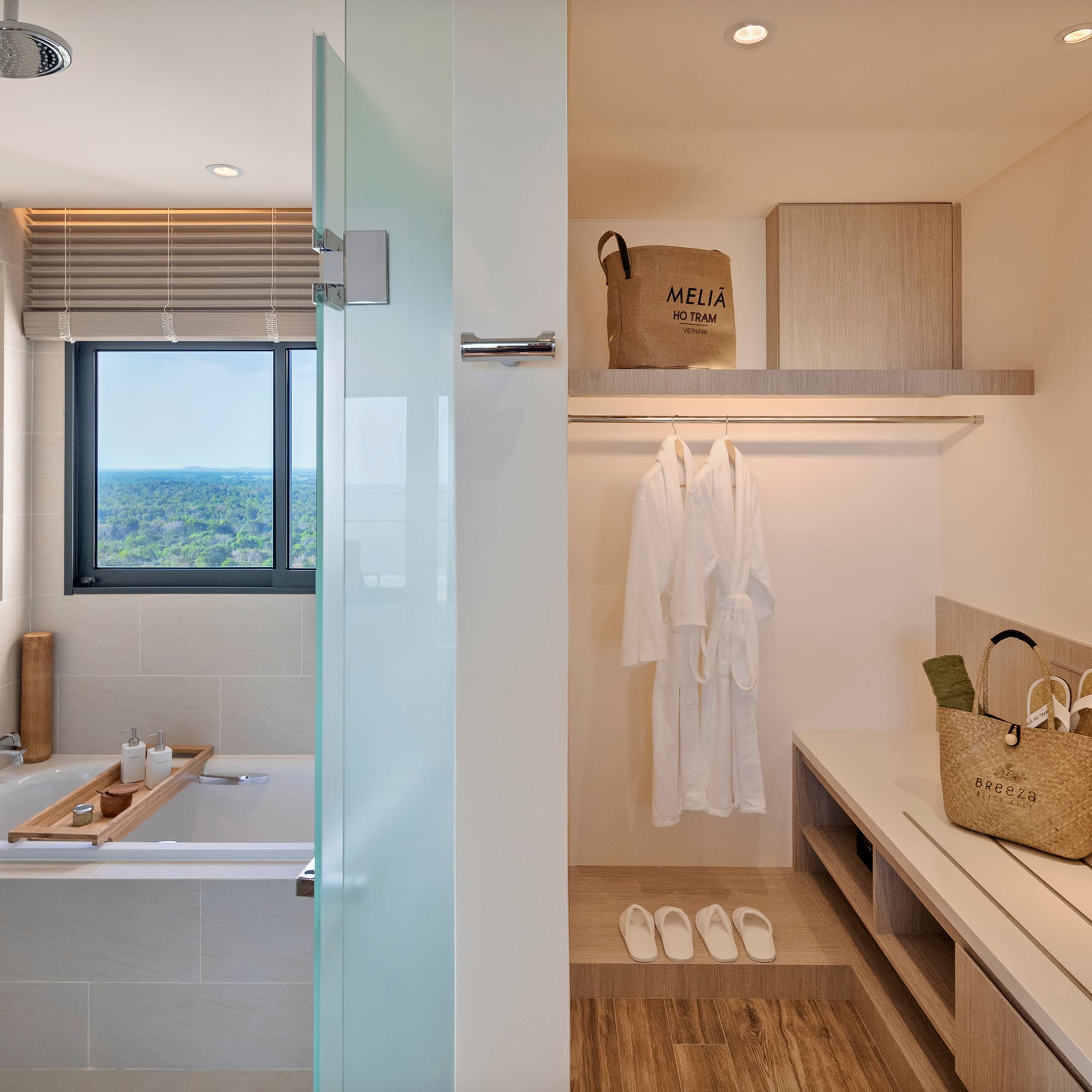 a bathroom with a bathtub and a tub