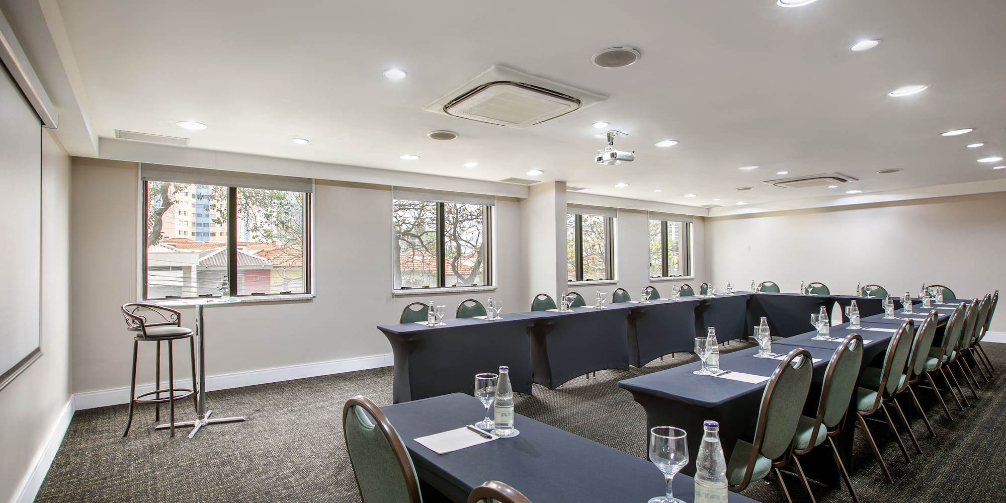 a room with tables and chairs