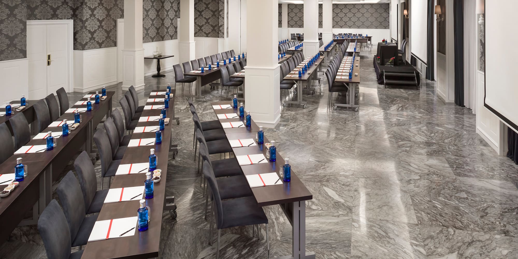 a room with tables and chairs