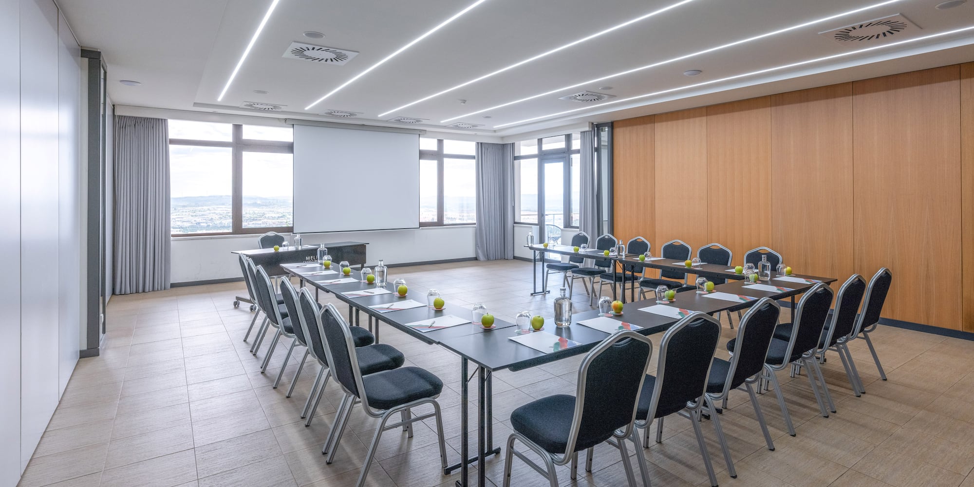 a room with a table and chairs