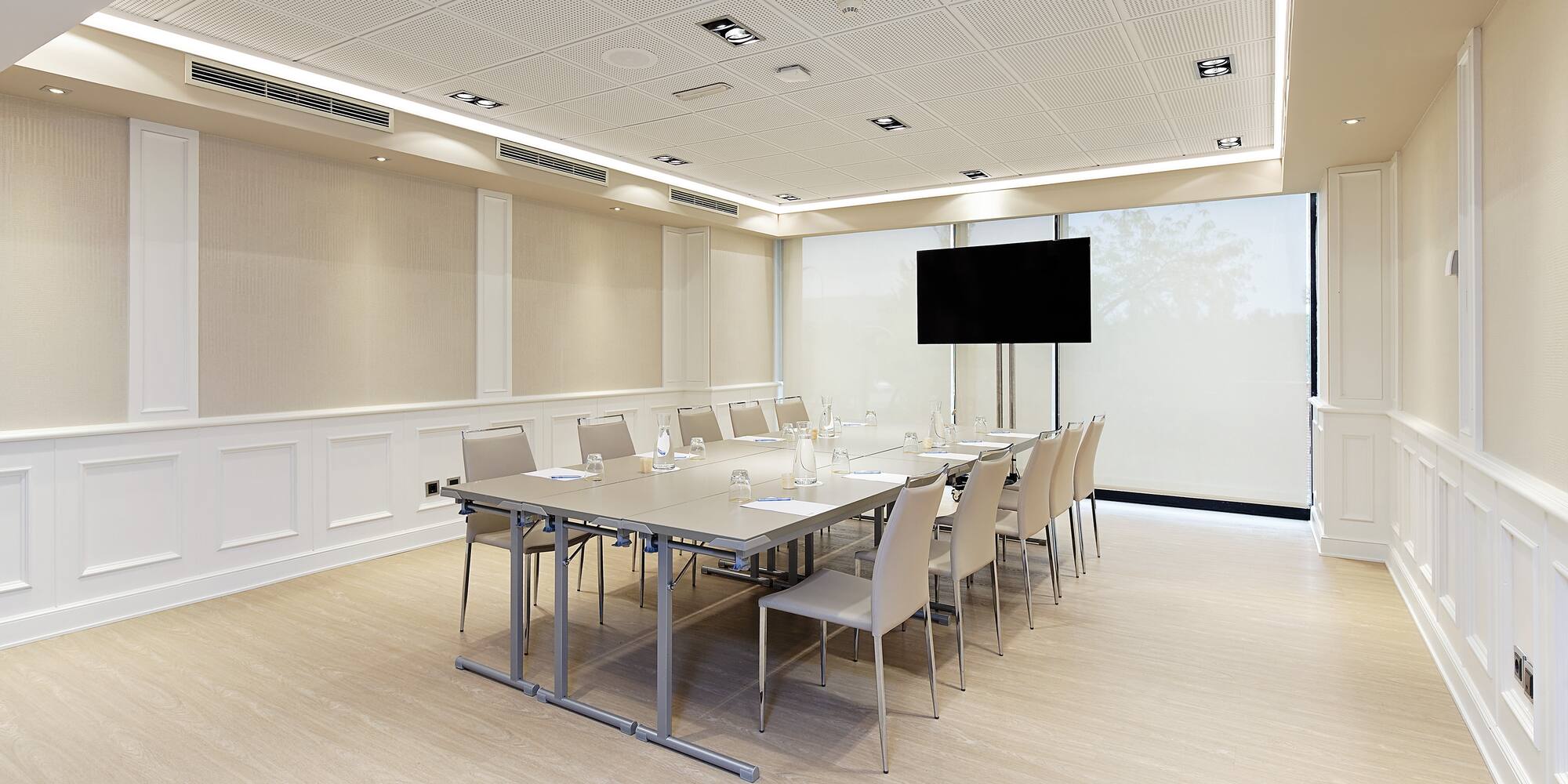 a room with a table and chairs