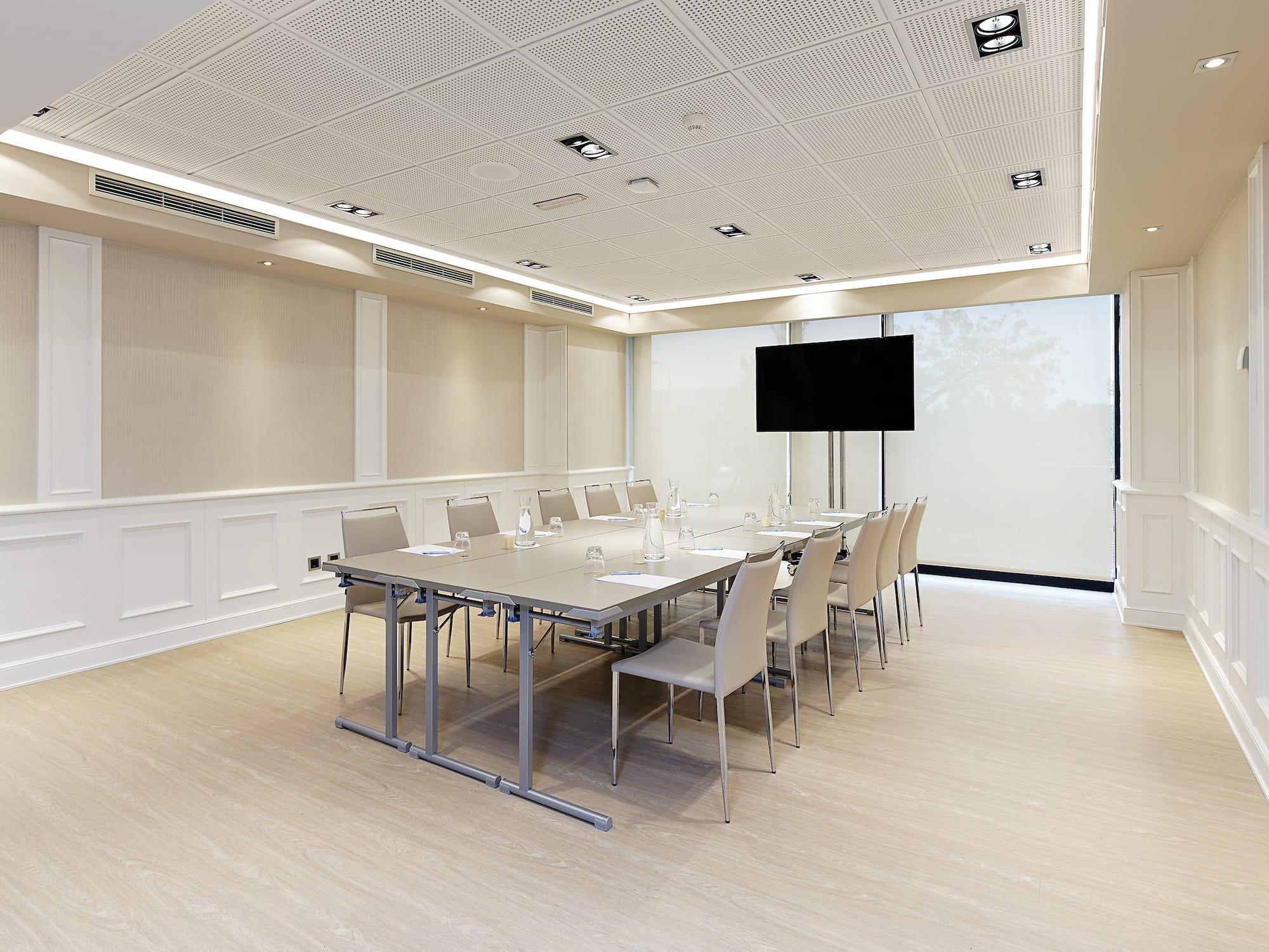 a room with a table and chairs